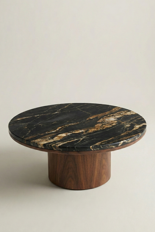 Round marble table with wooden base on a light background