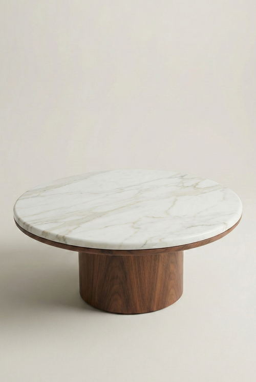 Round marble coffee table with wooden base on a plain background